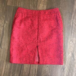Akris two tone red wool pencil skirt, front slit with faux leather panel behind